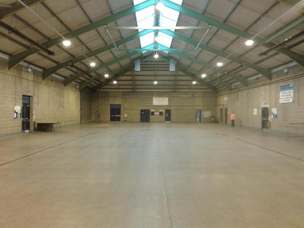 A empty industrial type hall with a triangular roof 